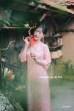 Áo dài gấm hồng phấn dáng suông