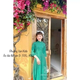 Áo dài đũi vân xanh lá chấm bi