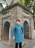 Áo dài taffa xanh thêu hạc