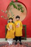 Áo dài thêu lân vàng