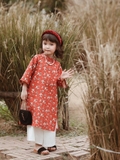 Aó dài đỏ cam hoa nhí