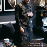 Áo dài gấm đen thêu nguyên tà
