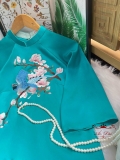 Áo dài lụa ngọc trai xanh thêu hoa