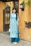 Áo dài tơ xanh thêu hoa, quần xanh