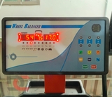 Máy cân bằng lốp Tecom - Model: TC-2000E