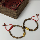 Vòng Trầm Trúc nữ mix vàng 24k (hạt gạo)