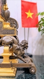 Đồng hồ chân nến đồng đen và có thiên thần