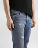 Dolce & Gabbana distressed logo-plaque jeans