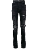 AMIRI distressed skinny jeans