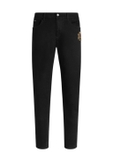 Dolce & Gabbana denim trousers with patch