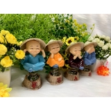 Bộ 4 tượng chú tiểu có đế lò xo