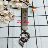 Móc khoá dây da T2 dài chất liệu da bò dập chìm logo