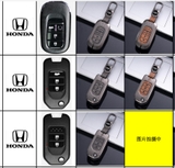 Bộ ốp kim loại mặt da + lưng da bò dập chìm logo mix móc khoá HONDA