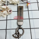 Móc khoá dây da T2 dài chất liệu da bò dập chìm logo
