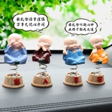 Bộ 4 tượng chú tiểu có đế lò xo