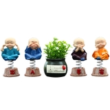 Bộ 4 tượng chú tiểu có đế lò xo