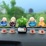 Bộ 4 tượng chú tiểu có đế lò xo