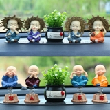 Bộ 4 tượng chú tiểu có đế lò xo