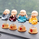 Bộ 4 tượng chú tiểu có đế lò xo