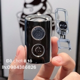combo ốp nhựa đen  Exciter+móc xoay 360 hình ô tô