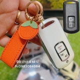 combo ốp khóa xe Airblade trắng bạc+móc hoa quả cam