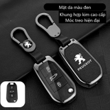 Bộ ốp kim loại lưng da + móc khoá dây da hãng Peugoet
