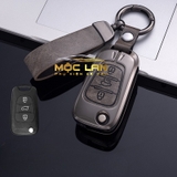Bộ ốp kim loại lưng da lộn dập chìm logo + móc khoá KIA