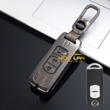 Bộ ốp kim loại mặt da + lưng da bò dập chìm logo mix móc khoá Mazda