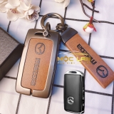 Bộ ốp kim loại mặt da + lưng da bò dập chìm logo mix móc khoá Mazda