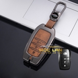 Bộ ốp kim loại lưng da lộn dập chìm logo + móc khoá TOYOTA