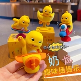 set 4 khủng long vàng lò xo nhún