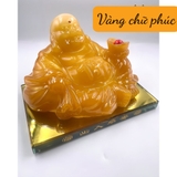 Tượng di lặc ngồi cầm thỏi tiền vàng