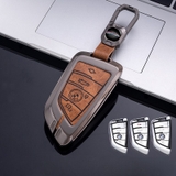 Bộ ốp kim loại mặt da + lưng da bò dập chìm logo mix móc khoá BMW