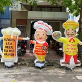 Rối hơi vẫy tay cửa hàng bia