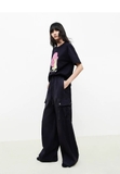 Tshirt MO&CO FREE KEIN đen họa tiết