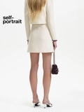 Chân váy SELF PORTRAIT kem viền đỏ