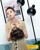 Áo polo MIUMIU nhũ vàng