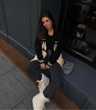 Cardigan SANDRO logo