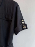 Váy AJE sơ mi logo tay