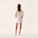 Váy AJE cổ bẻ tay lỡ dây đan trước