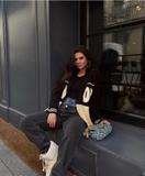 Cardigan SANDRO logo