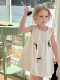 Váy Ngắn Bí Trắng Nơ Đen Peach