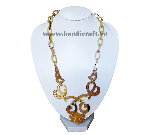 Natural horn with large carved pendant necklace