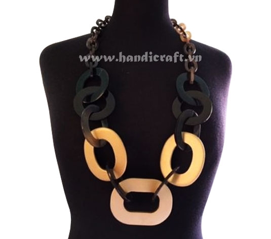 Dark horn with lacquer pendant