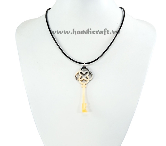 Key shaped horn pendant