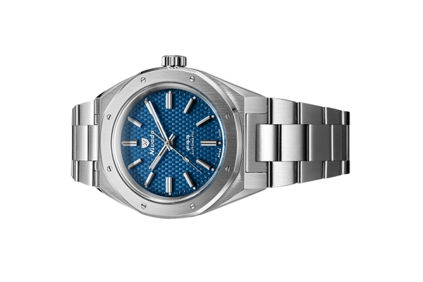 Đồng hồ đeo tay thương hiệu Nivada Grenchen, dòng sản phẩm F77, Ref number: 68041A77B, mặt số xanh họa tiết, size 41mm, máy tự động, vỏ và dây đồng hồ bằng thép 316L, mới 100%