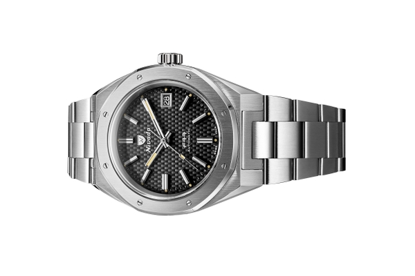 Đồng hồ đeo tay thương hiệu Nivada Grenchen, dòng sản phẩm F77, Ref number: 69041A77A, mặt số đen họa tiết, size 41mm, máy tự động, vỏ và dây đồng hồ bằng thép 316L, mới 100%