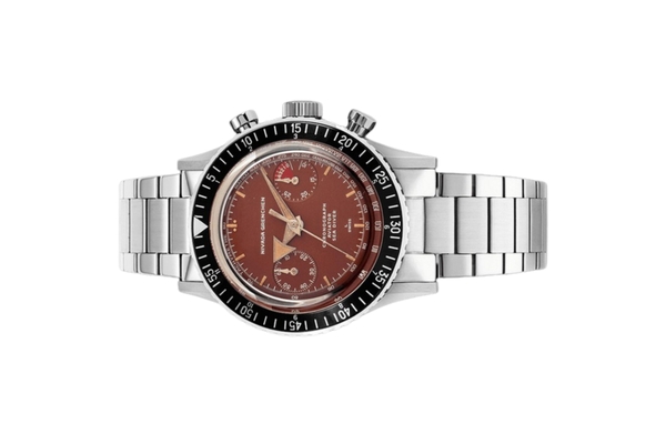 Đồng hồ đeo tay thương hiệu Nivada Grenchen, dòng sản phẩm Chronomaster, Ref number: 85007M, mặt số màu đỏ tropical size 38mm, lên dây cót bằng tay, vỏ và dây đồng hồ bằng thép không gỉ, mới 100%