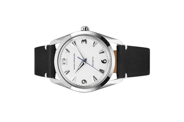 Đồng hồ đeo tay thương hiệu Nivada Grenchen, dòng sản phẩm Antarctic, Ref number: 35005M, mặt số trắng Matt, size 35mm, máy lên cót tay, vỏ bằng thép không gỉ 316L, dây da bò, mới 100%