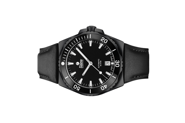 Đồng hồ đeo tay thương hiệu Tutima, dòng sản phẩm M2 Seven Seas S, Ref no: 6156-13, mặt số đen Deep, size 40mm, máy tự động, vỏ đồng hồ thép không gỉ, dây cao su phủ da, hàng mới 100%